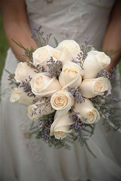 Have you chosen white as your signature wedding color? Simple, white rose bouquet with fall colors | Wedding ...