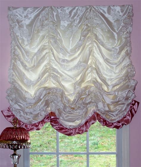 (roman shade) this window treatment style consists of a fabric shade with wooden slats inserted horizontally at intervals down its entire length. Sweet white/pink silk Austrian roman shade made for Hayley ...