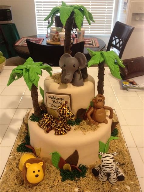 Same as the banner acorss the top. Baby shower cake. Lion . Giraffe . Monkey . Elephant ...