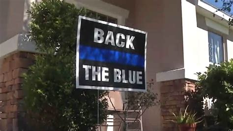 Feelin' bad can feel so good feelin. 'Back the Blue' signs supporting cops must go, homeowners ...