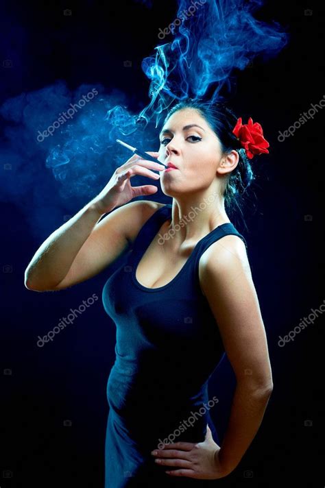 Disco lady takes you where saturday night fever would not dare!!! Sexy looking spanish women smoking cigarette — Stock Photo ...