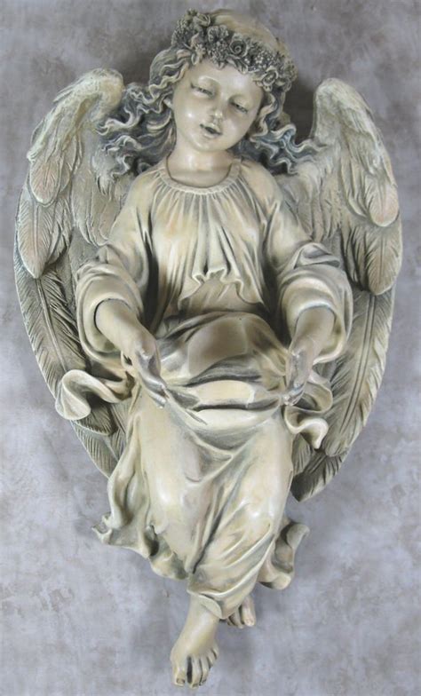 The 26 roof angels, fully rebuilt, were restored and continue to gleam cheerfully from saint mary's roof tops. Vintage 2005 Home Interiors Beautiful Cherub Angel Wall ...