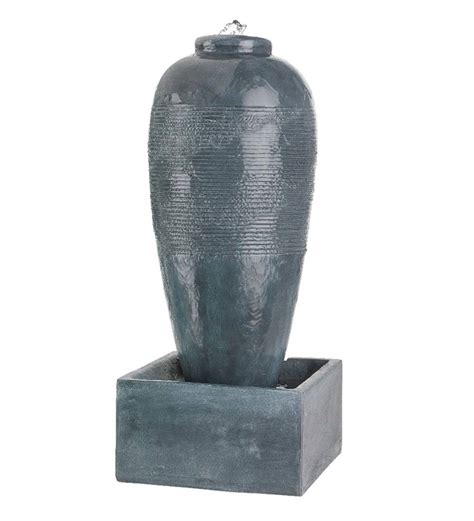 Outdoor jar water fountain with interior pump. Gray Indoor/Outdoor Jar Fountain | Wind and Weather