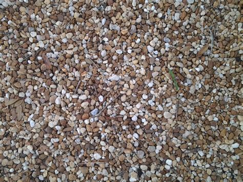 Where to buy stone and rock in arkansas? Gravel. | Landscaping on a hill, Landscaping with rocks ...