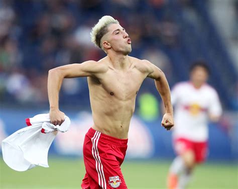 Balotelli poses for a selfie with pitch invaders (picture: Balotelli Pose. / Rejoicing of Kevin Kampl. | Fussball ...