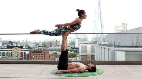 Keeping the spine straight and chest lifted, slowly begin to straighten legs. 5 Best And Easy Couples Yoga For Beginners - 101YogaStudio