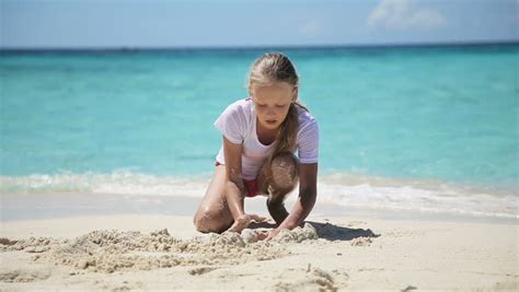 The gallery presents such collections as: Young Girls Playing On A Tropical Beach With Seashells ...