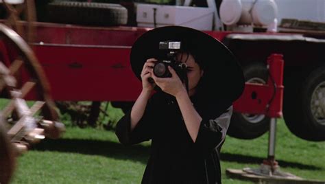 Shake, shake, shake, senora, shake your body line. Nikon Photo Camera Used by Winona Ryder in Beetlejuice ...