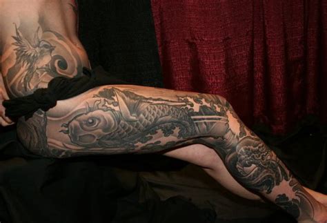 Snake tattoos can either fascinate or cause negative feelings. leg tattoo tribal snake img on tatto body tattoo | Leg tattoos, Body tattoos, Tribal tattoos