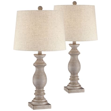 This stylish tall rustic chic light this modern farmhouse table lamp has a glass shade and a raw metal base. Home in 2020 | Farmhouse table lamps, Traditional table ...