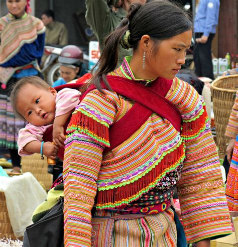 However, many continue to live in far southwest china mostly in the provinces of yunnan , guangxi and to a very limited extent in guizhou. Flower Hmong | Vietnam. Colorful Bac Ha market. WATCH THE VI… | Flickr