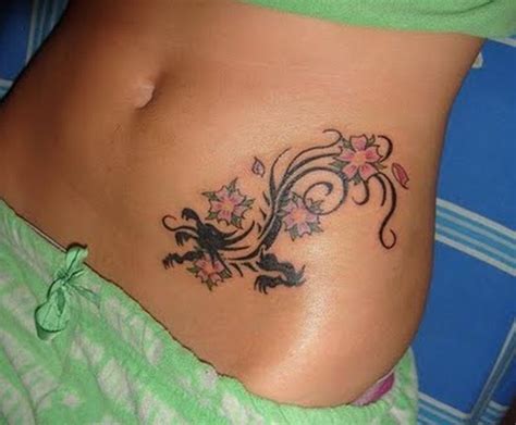 Black mermaid tattoo on belly button. 150+ Cute Stomach Tattoos for Women (2021) - Belly Button ...