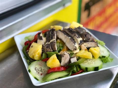 For irie jamaican kitchen, it's all about the flavors of the islands. Jerk Chicken Salad | Food, Jerk chicken, Food truck