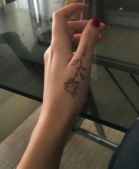 I wanted to get my first tattoo? Rose hand tattoo idea | Rose hand tattoo, Small rose ...
