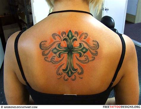 There are many ways to go with a cross tattoo. 50 Cross Tattoos | Tattoo Designs of Holy Christian ...