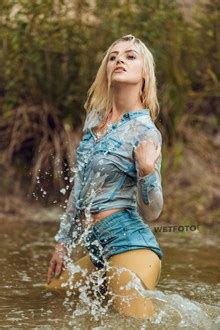 Louise cools off by dipping her bare feet in an icy stream.see more at www.ilovelegsandfeet.com. Blonde Girl in Yellow Pantyhose and Jeans Clothes Gets ...