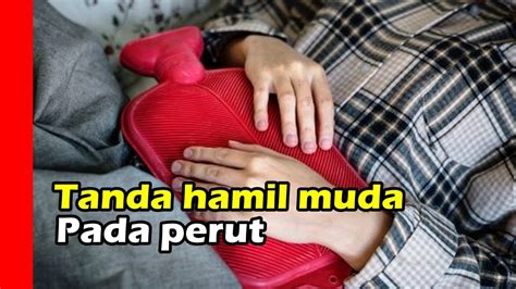 Tanda hamil muda pada perut yang pertama adalah kram perut bagian bawah. 5 Tanda tanda Hamil Muda pada Perut - YouTube