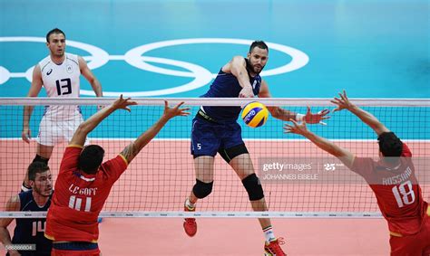 Volleyball is one of the sports that is played at the summer olympic games in two disciplines: Italy's Osmany Juantorena spikes the ball during the men's ...