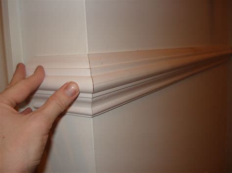 Locate the studs in the wall and mark them with a pencil or bits of masking tape. How To Install Chair Rail Molding In Your Home