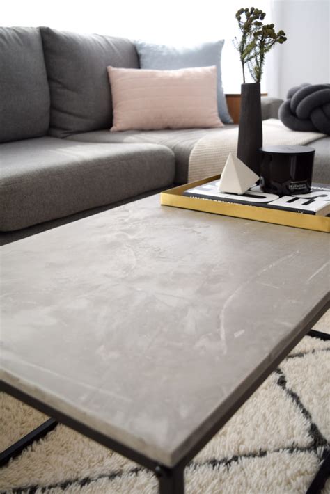 Sitting in my storage room was a little oak look side table $19 from kmart which i hadn't used yet and the round top looked perfect for the basket. Kmart hack coffee table: How to concrete render a cheap ...