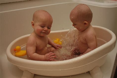 In other tubs, the bottom has a textured surface to prevent slipping. A Tale of Two Babies: 2 babies + 1 bath = LOTS of fun!