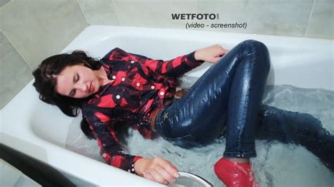 © wetlook with wetfoto.com all rights reserved. Wetlook by Happy Brunette Girl in Bright Shirt, Tight ...