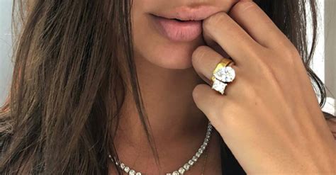 The ring, comprised of pear and square cut diamonds, plays with minimal design for maximum impact; Emily Ratajkowski's Engagement Ring Will Be 2020's Most ...