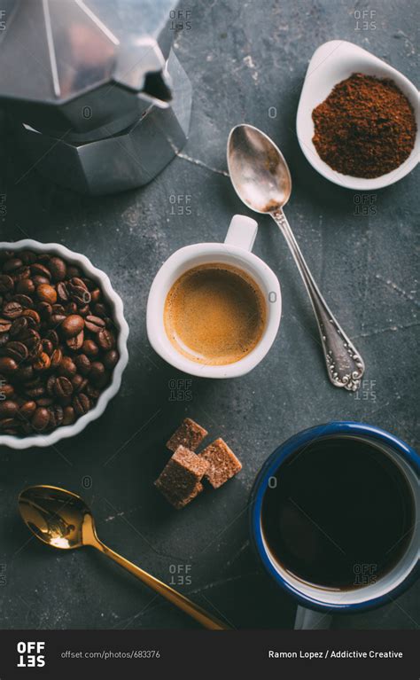 Check spelling or type a new query. Coffee cup with coffee beans and ground coffee stock photo - OFFSET