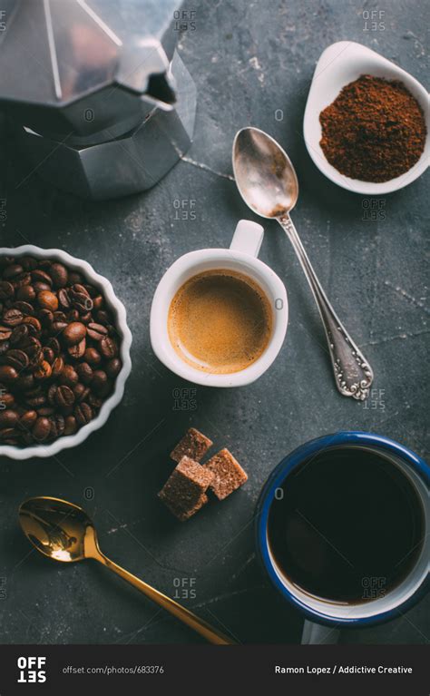 Outdoor composting can use a bin, coffee canister, or simply be done in a pile on the ground. Coffee cup with coffee beans and ground coffee stock photo ...