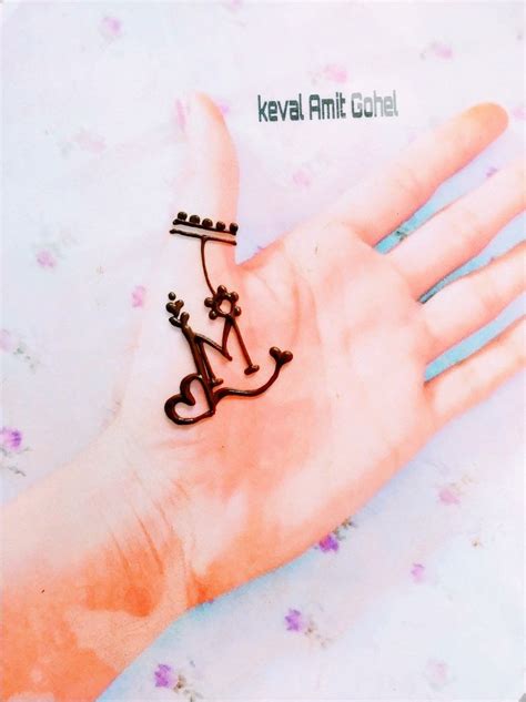 In the following, we've created a list of the 25 best hair designs we've found. M Letter Mehndi Tattoo Design | Henna tattoo designs ...