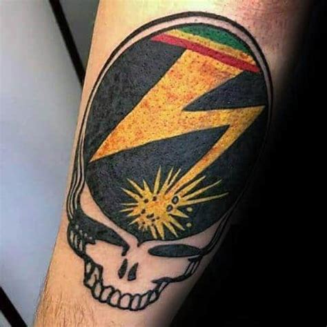 It can be worn by men and by women, symbolizing different things: 50 Grateful Dead Tattoo Designs For Men - Rock Band Ink Ideas