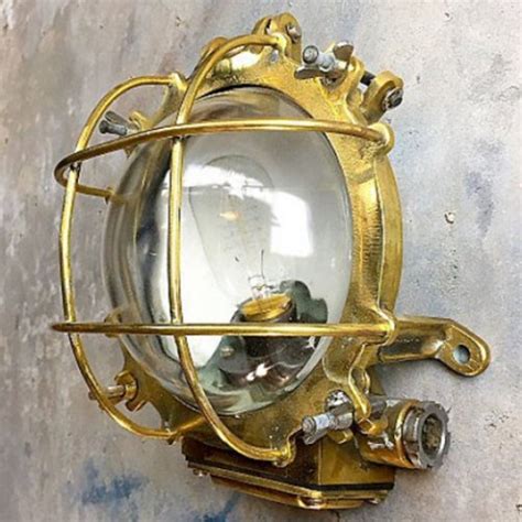 Outdoor wall light (1) 5 stars 100%: Antique bulkhead wall light in brass - Target Cage