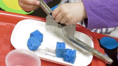 Looking for some fun games and activities for kindergartners to keep your little one occupied — and learning — at home? fine motor use a garlic press to squeeze water from ...