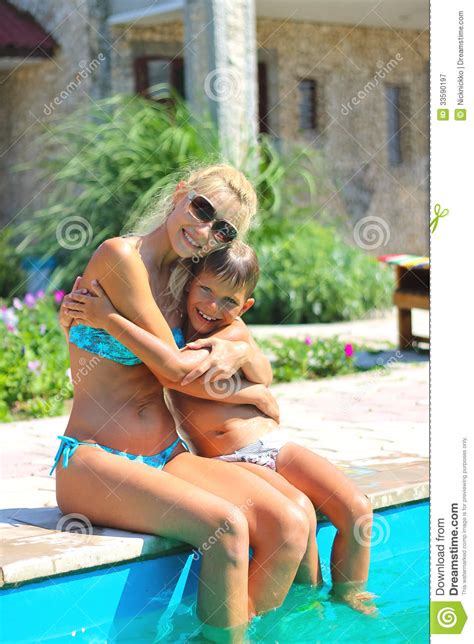 Happy Mother And Son Near Pool Royalty Free Stock ...