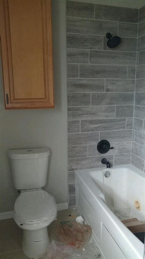 Get great deals at target™ today. Gray Wood Plank Tile With Oil Rubbed Bronze Fixtures ...