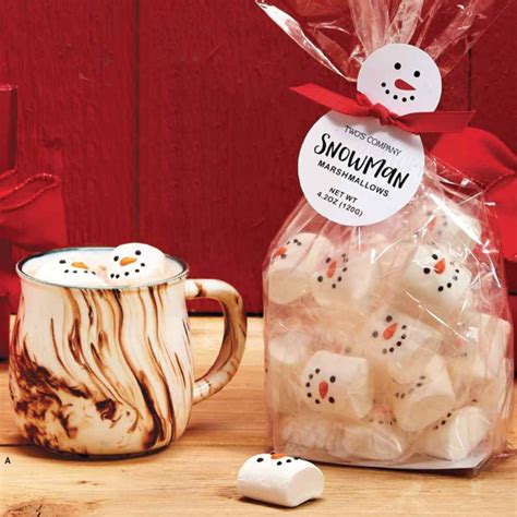 Wrap red and white ribbons around simple white candles for christmas flare, as seen here. Snowman Marshmallow Candy in Gift Bag