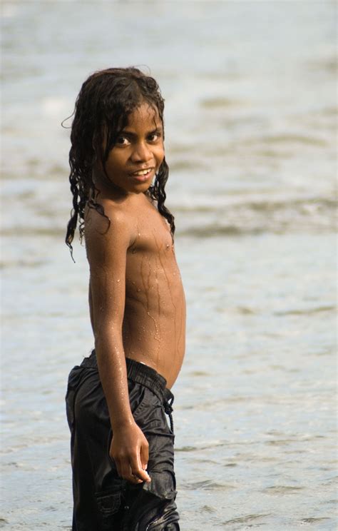 Let the hair on the back spread over the neck for a feral look. File:Long haired boy.jpg - Wikimedia Commons