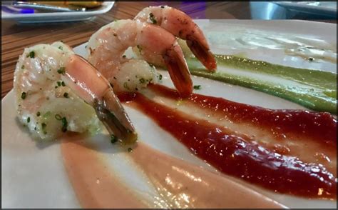 When you place cocktail sauce on a large platter and surround it by shrimp, the large shrimp fill the space nicely, look beautiful, and they are easiest for. Individual Shrimp Cocktail Presentations : Modern Prawn ...