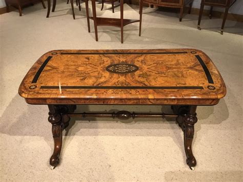 For a luxurious look, choose a coffee table with a marble top. A Victorian Period Burr Walnut & Ebony Inlaid Antique ...