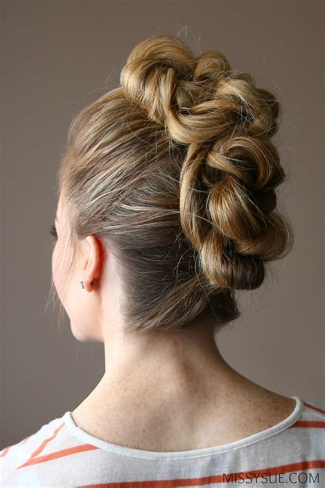 The top section of the head is curled and each curl is rolled and set with a bobby pin. Knotted Mohawk | MISSY SUE