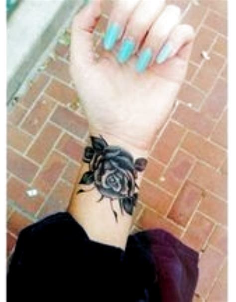 Dagger & rose what the heck is the original tattoo of, a torn up and scabbed knee?! Pin by Sophia Covert on Tattoo in 2020 | Wrist tattoo ...