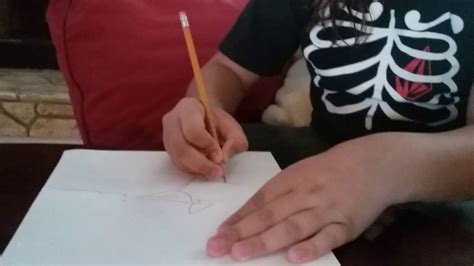 Each player then studies the received drawing, turning in all directions looking for imaginary ideas. Blind fold drawing - YouTube