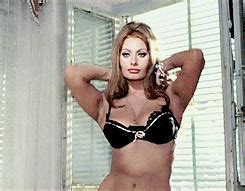 Blonde milf does a holiday strip tease in lingerie and boots. Sophia Loren GIF - Find & Share on GIPHY