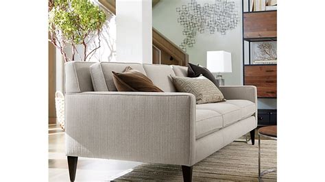 Now a crate and barrel classic, its pure 1960s aesthetic is scaled deep so you can sit firm and upright, but also slouch back in comfort. Rochelle Sofa | Crate and Barrel