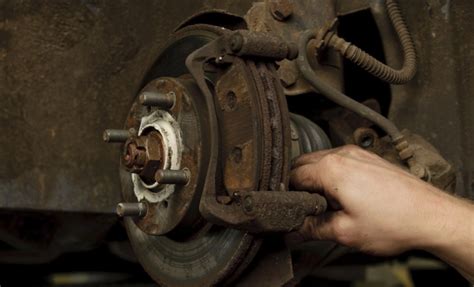 Use a large long bolt, washers and two nuts. How Do You Remove A Stuck Rotor, Lug Nut or Caliper ...