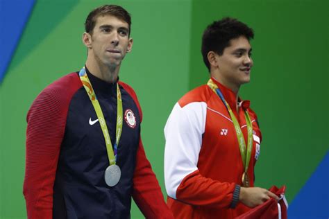 During the victory lap after the race. Phelps Loses to 21-Year-Old Joseph Schooling Who Idolized ...