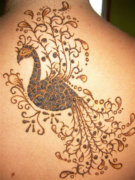 Henna flowers tattoo on back hand. Mehndi Designs 2012: Henna Tattoos