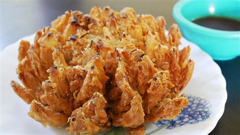 Blooming onion slice your onion about 3/4 of the way down, being careful not to cut to the bottom. Blooming Onion Recipe | How To Make Blooming Onion | DIY ...