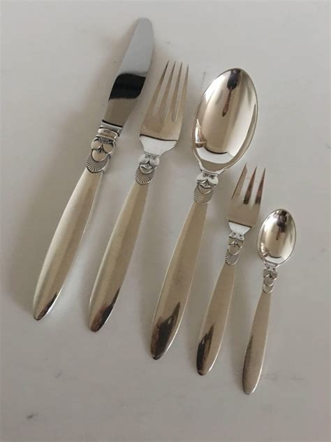 Teaspoons and luncheon forks a danish silver flatware service, georg jensen silversmithy, copenhagen, 20th century, cactus pattern, comprising: Georg Jensen Sterling Silver Cactus Flatware Set for 12 ...