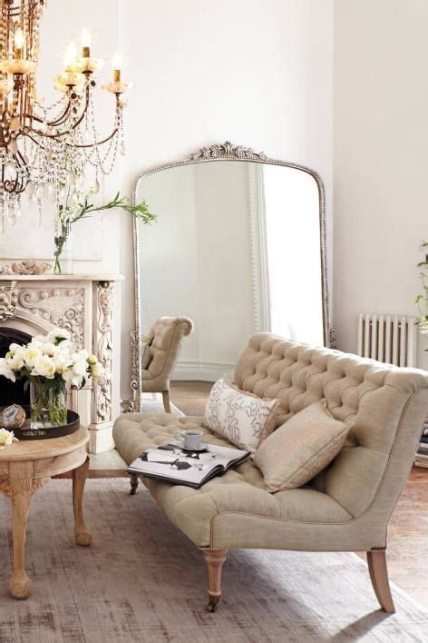 Perfect place for a mirror inside a bedroom as it gives this vintage, edgy feel to the charming grey bedroom design where the vintage shapes on the bedroom contrast with the minimalism of the rectangular mirror, while a pendant bulb. Eye For Design: Decorate With Large, Ornate Leaning Mirrors